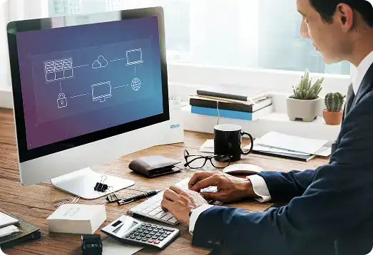 Business professional working on cloud computing and data security on desktop.