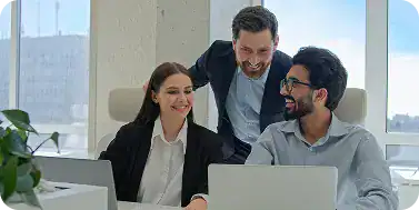 Business team collaborating in a modern office for i3solutions project.